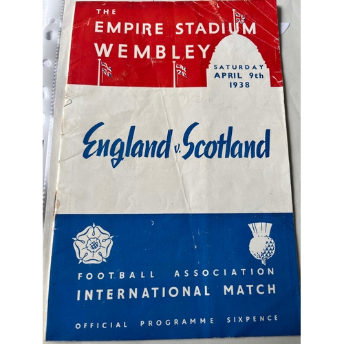 21 - 1938 England v Scotland, slightly torn cover.Rusty staples, cover starting to loosen