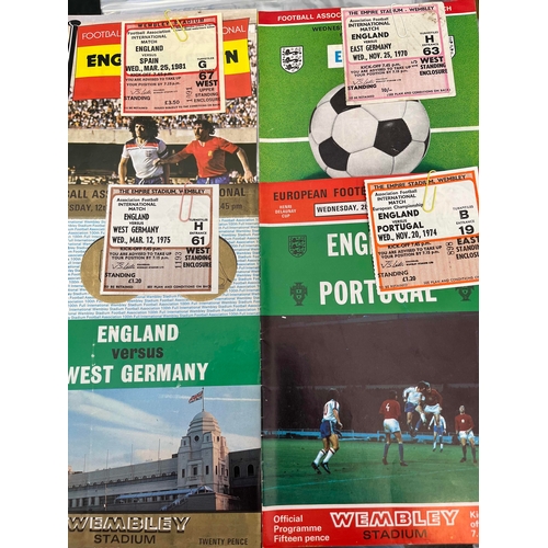 416 - 6 x England programmes with Tickets, East Germany 1970 (Creased) Argentina 74, Portugal 75, West Ger... 