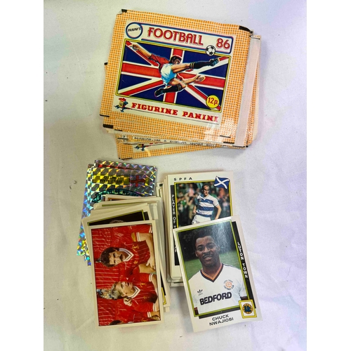 313 - 170 + Panini Loose stickers from Football 86, includes empty sticker packets. Slight duplication and... 