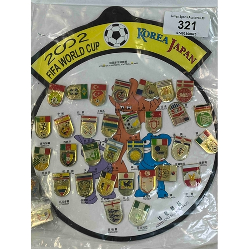 321 - Collection of badges from the 2002 World Cup in Japan. In a presentation Packet and is a nice collec... 