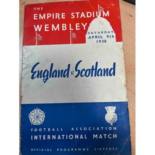 7 - 1937/38 England v Scotland at Wembley. Creased and marked cover and back, Rusty staples in centre bu... 