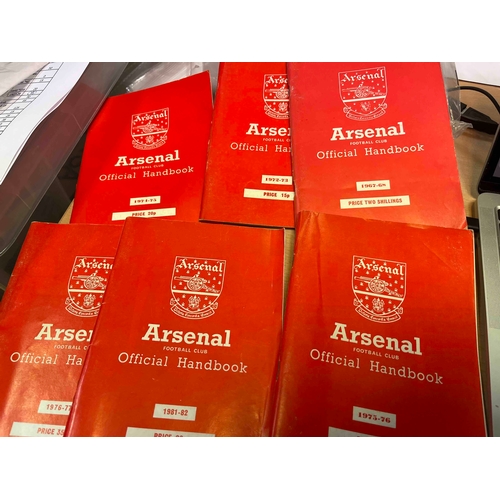 18 - 7 x Arsenal Handbooks 66/67, 67/68, 72/73, 74/75, 75/76, 76/77 and 81/82.