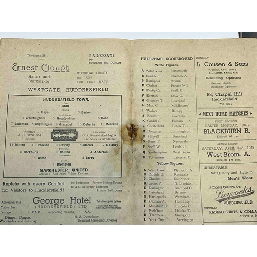 271 - 1947/48 Huddersfield v Manchester United, 27/3/48, No Staple, bleeding around staple area.