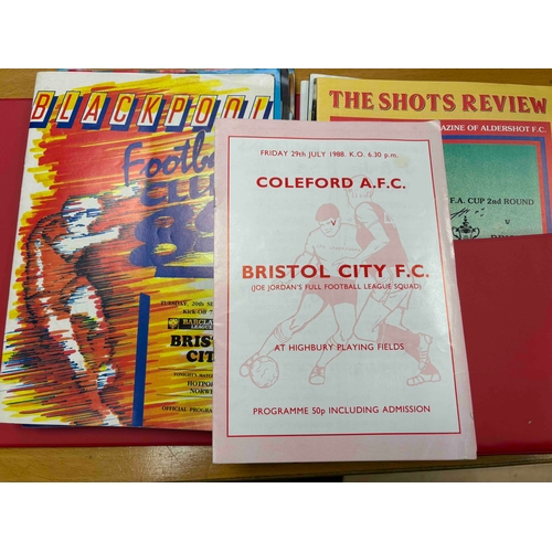 227 - 1988/89 Bristol City Embossed Folder with 35 Away Programmes.