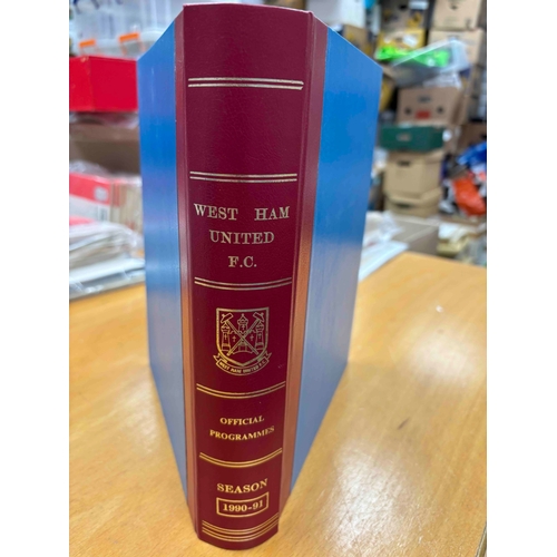 103 - 1990/91 West Ham United Embossed Programme folder with 23 home programmes in great condition.