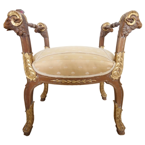 244 - A GOOD REGENCY STYLE GILT DECORATED RAMS HEAD STOOL, EARLY 20TH CENTURY,  upon gilt decorated legs, ... 