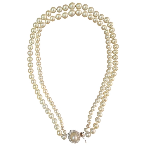 61 - A DOUBLE STRAND PEARL NECKLACE WITH A CIRCULAR DIAMOND CLASP           **PLEASE NOTE: THIS AUCTION I... 