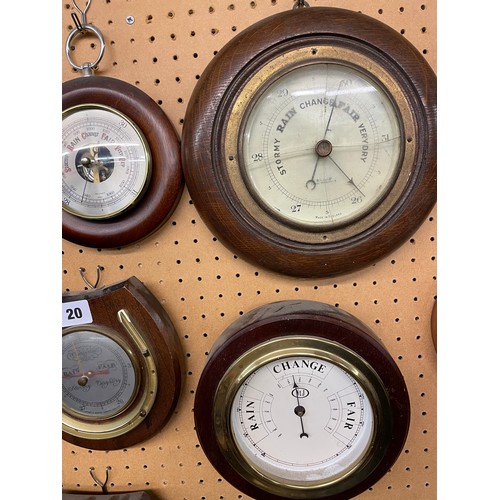 20 - NINE WOODEN CASED ROUNDEL SHIP'S STYLE BAROMETERS INCLUDING HORSESHOE EXAMPLES