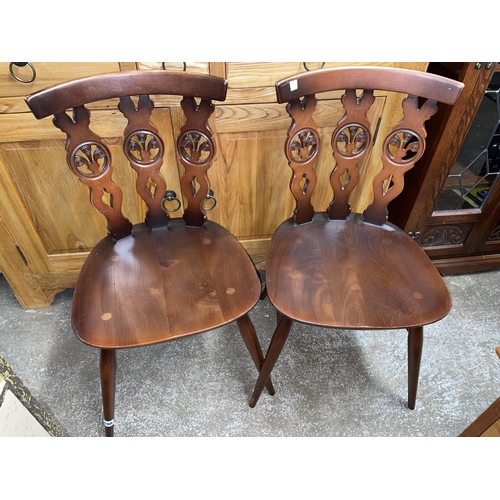 108 - PAIR OF ERCOL PRINCE OF WALES PLUME BAR BACK CHAIRS