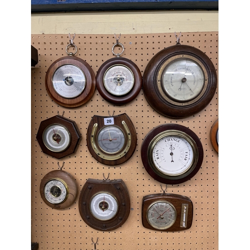 20 - NINE WOODEN CASED ROUNDEL SHIP'S STYLE BAROMETERS INCLUDING HORSESHOE EXAMPLES