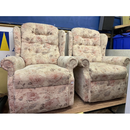 215 - PAIR OF FLORAL UPHOLSTERED WING ARMCHAIRS