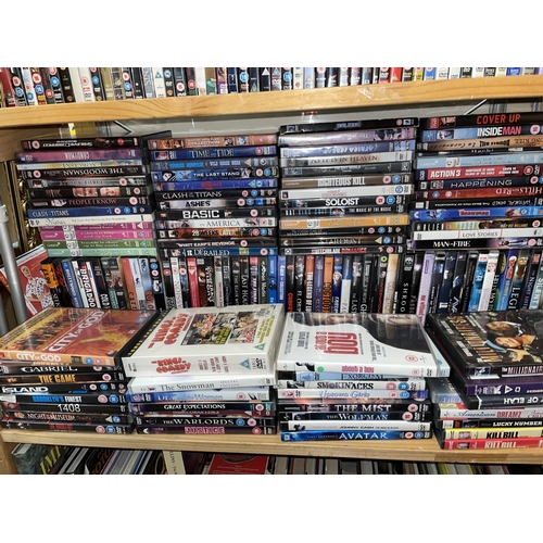 265 - TWO SHELVES OF DVDS