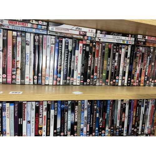 282 - TWO SHELVES OF VARIOUS DVDS FEATURE FILMS