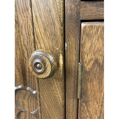 4 - ERCOL MEDIUM ELM GLAZED DRESSER CABINET