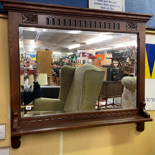 89 - OLD CHARM OAK CARVED LUNETTE MIRROR WITH SHELF