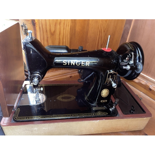 185 - CASED SEWING MACHINE