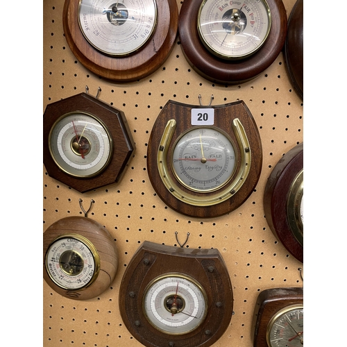 20 - NINE WOODEN CASED ROUNDEL SHIP'S STYLE BAROMETERS INCLUDING HORSESHOE EXAMPLES