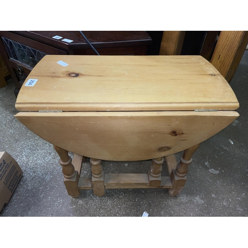 204 - LIGHT WOOD GATELEG DROP LEAF TABLE