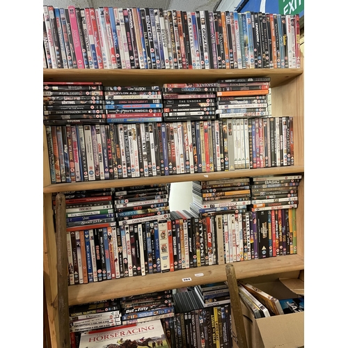 264 - FOUR SHELVES OF VARIOUS DVDS