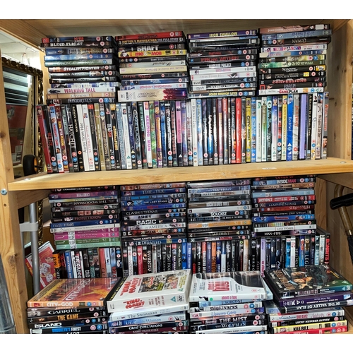 265 - TWO SHELVES OF DVDS