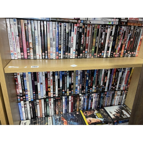 282 - TWO SHELVES OF VARIOUS DVDS FEATURE FILMS