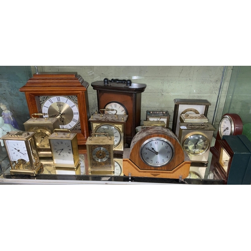 314 - SHELF OF MAINLY QUARTZ CARRIAGE CLOCKS, SMALL MANTLE CLOCKS, OTHER TIME PIECES