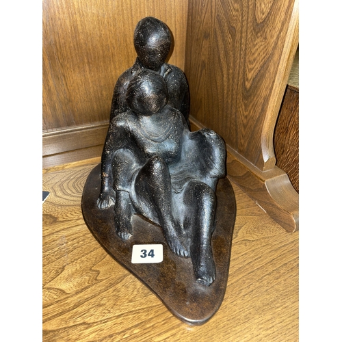 34 - ALAN SATCHWELL BRONZED EFFECT SCULPTURE ENTITLED SEATED COUPLE