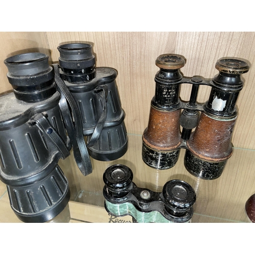 373 - SHELF OF PAIRS OF BINOCULARS INCLUDING MIRANDA WIDE ANGLE 8X40, HALINA 10X50, AND FIELD GLASSES