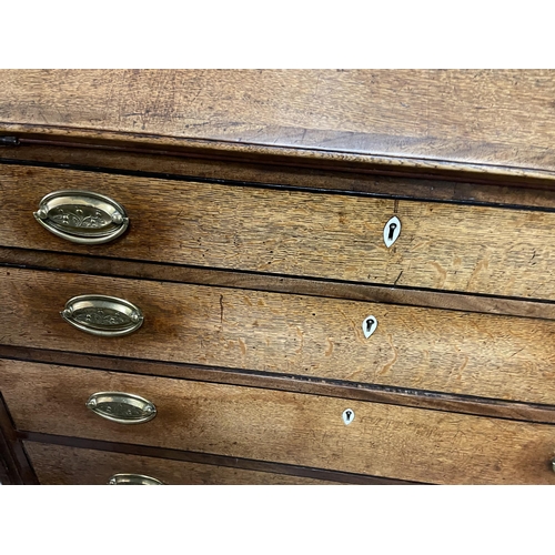 40 - GEORGE III OAK BUREAU WITH A FITTED INTERIOR