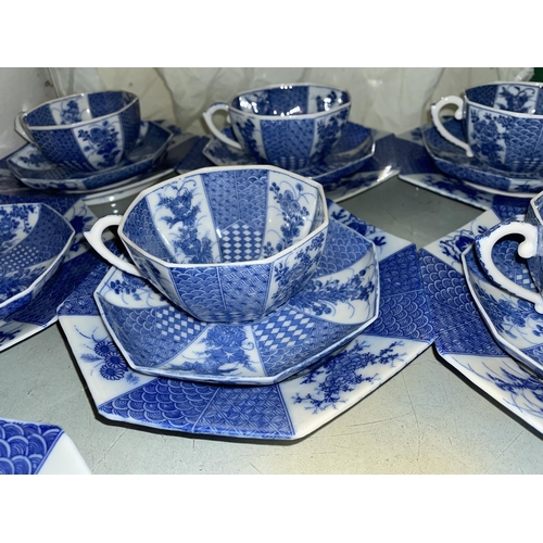 437 - JAPANESE BLUE AND WHITE OCTAGONAL TEA SET WITH LARGER PLATES AND BOWL