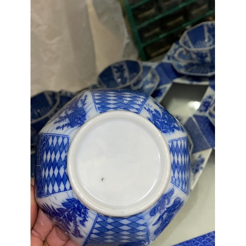 437 - JAPANESE BLUE AND WHITE OCTAGONAL TEA SET WITH LARGER PLATES AND BOWL