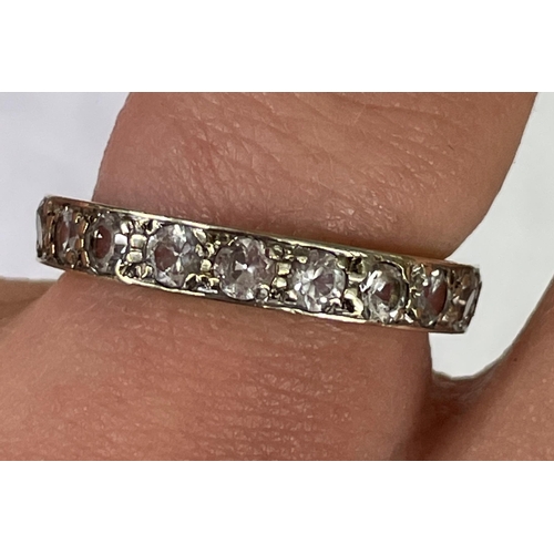 525 - 9CT WHITE GOLD AND DIAMOND ETERNITY BAND