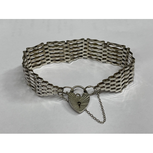 539 - LADIES SILVER SIX GATE BRACELET WITH HEART PADLOCK