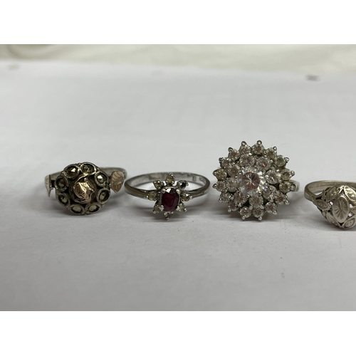 540 - THREE SILVER DRESS RINGS WITH CZ STONES