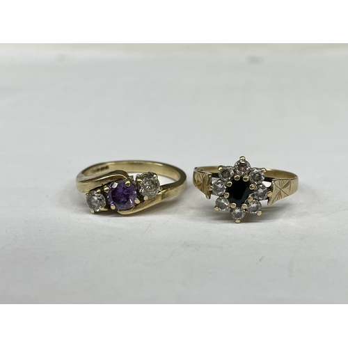 544 - 9CT GOLD AMETHYST AND CZ CROSS OVER RING SIZE N, AND 9CT GOLD SAPPHIRE AND CZ CLUSTER RING 6.4G OVER... 