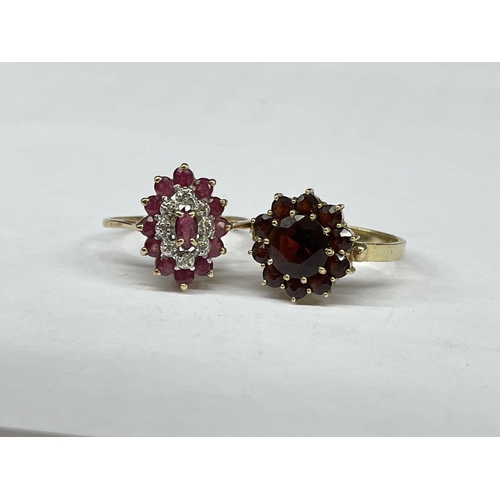 546 - 9CT GOLD RUBY MARQUISE CLUSTER CZ RING 2.2G APPROX AND AN UNMARKED YELLOW METAL GARNET CLUSTER RING