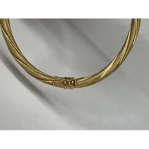 547 - 9CT GOLD HOLLOW ROPE TWIST BANGLE WITH SAFETY CLASP 4.9G APPROX