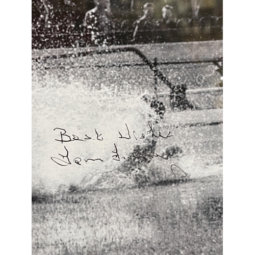 561 - BLACK AND WHITE PHOTOGRAPH OF TOM FINNEY SIGNED IN BIRO FRAMED AND GLAZED