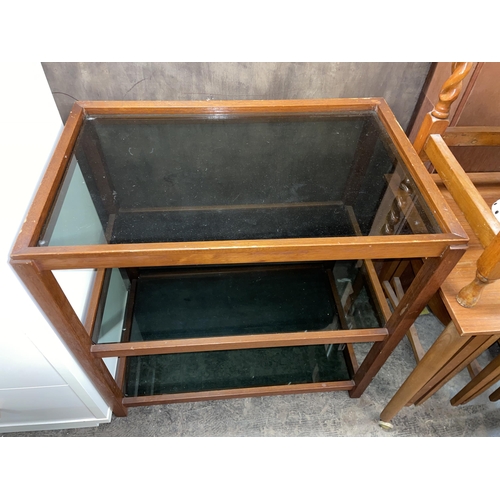 74 - TWO GLASS TOPPED TEAK TABLES