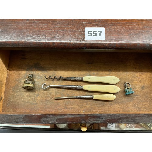 557 - SMALL OAK SINGLE DRAWER BOX CONTAINING BONE HANDLED ACC0UTREMENTS AND SEAL FOB