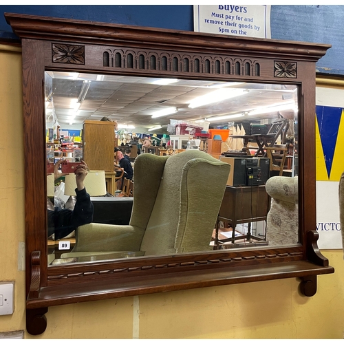 106 - OLD CHARM OAK CARVED LUNETTE MIRROR WITH SHELF