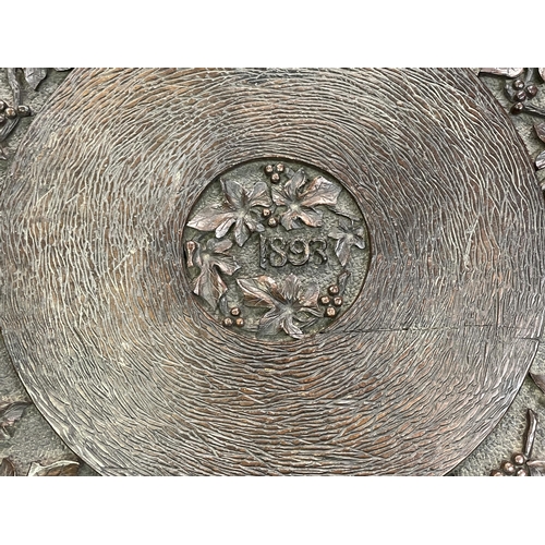 110 - CARVED CIRCULAR TOPPED CRICKET TYPE TABLE