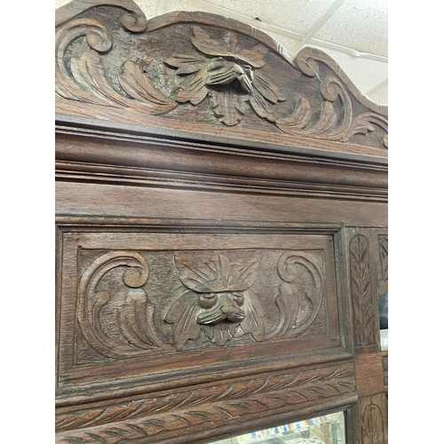 118 - LATE VICTORIAN CARVED OAK MIRRORED HALL STAND AND THREE UPHOLSTERED CHAIRS