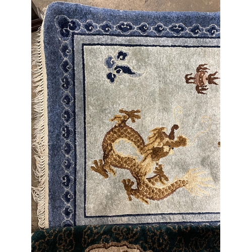 241 - TWO SILKY DRAGON PATTERNED FRINGED CARPET RUNNERS