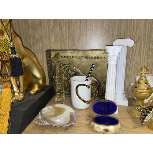 300 - SHELF OF ORNATE HOME DECOR INCLUDING ALABASTER COLUMNS, GLASS OBELISK, AND EGYPTIAN CAT FIGURE