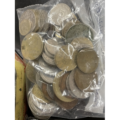 481 - TIN OF MIXED WORLD COIN CURRANCY