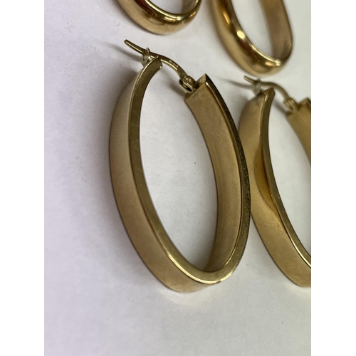 485 - PAIR OF 9CT OVAL HOOP EARRINGS 4.9G APPROX, AND A SIMILAR PAIR OF UNMARKED YELLOW METAL EARRINGS