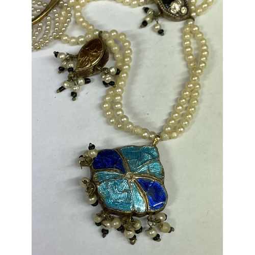 491 - TWO SEED PEARL SPRAY BROOCHES AND A TWO STRAND ENAMEL AND DROPPER NECKLACE WITH REVERSABLE PENDANTS