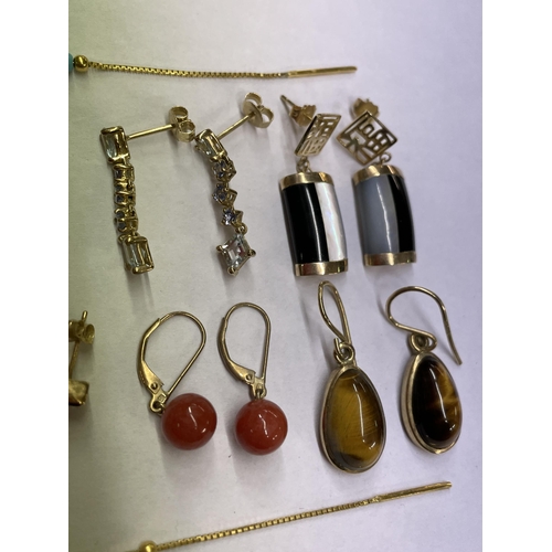 492 - SELECTION OF 9,10 & 14K TIGERS EYE, TURQUOISE, AND BEAD SET EARRINGS 22.2G OVERALL