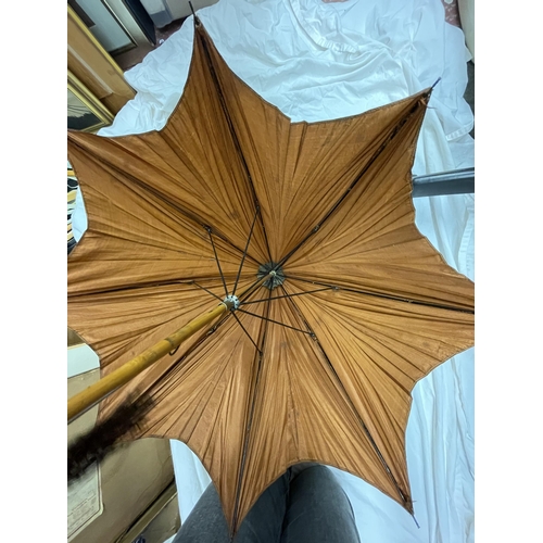 515 - VINTAGE BROWN SILK PARASOL WITH DECORATIVE TASSEL